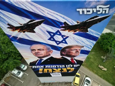 A drone view of an election campaign display for Israeli Prime Minister Benjamin Netanyahu's Likud party, depicting Netanyahu and US President Donald Trump with the words in Hebrew "we have one opportunity to win!", the day before Israel's national election, in Tel Aviv, Israel, October 26, 2026. REUTERS/Amir Cohen