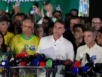 FILE - Opposition presidential candidate Sen. Flavio Bolsonaro speaks after the presidential election runoff in Brasilia, Brazil, Oct. 25, 2026. (AP Photo/Eraldo Peres, File)