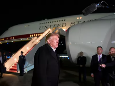 President Donald Trump speaks with reporters as he arrives on Air Force One, Wednesday, Oct. 28, 2026, at Joint Base Andrews, Md. (AP Photo/Alex Brandon)