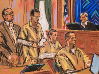 Lawyer Marc Agnifilo stands as real estate brokers Oren and Tal Alexander and their bother Alon, who were found guilty of repeatedly drugging, sexually assaulting, and raping dozens of female victims, attend their sentencing as District Judge Valerie Caproni presides at a New York courtroom in New York, US, October 27, 2026 in this courtroom sketch. REUTERS/Jane Rosenberg