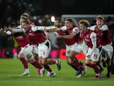 Soccer Football - Carabao Cup - Fourth Round - Fleetwood Town v Arsenal - Highbury Stadium, Fleetwood, Britain - October 27, 2026 Fleetwood Town's Rhys Bennett and teammates celebrate winning the penalty shootout REUTERS/Jon Super EDITORIAL USE ONLY. NO USE WITH UNAUTHORIZED AUDIO, VIDEO, DATA, FIXTURE LISTS, CLUB/LEAGUE LOGOS OR 'LIVE' SERVICES. ONLINE IN-MATCH USE LIMITED TO 120 IMAGES, NO VIDEO EMULATION. NO USE IN BETTING, GAMES OR SINGLE CLUB/LEAGUE/PLAYER PUBLICATIONS. PLEASE CONTACT YOUR ACCOUNT REPRESENTATIVE FOR FURTHER DETAILS..   TPX IMAGES OF THE DAY