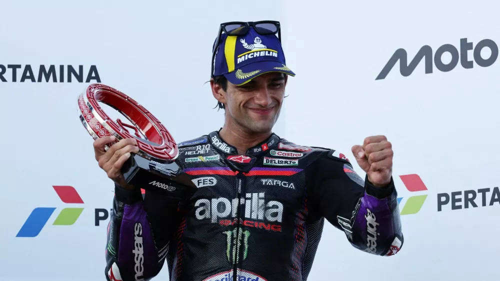 FILE PHOTO: MotoGP - Indonesian Grand Prix - Mandalika International Street Circuit, Mandalika, Indonesia - October 11, 2026 Third place Aprilia Racing's Jorge Martin celebrates on the podium with a trophy after the MotoGP race REUTERS/Willy Kurniawan/File Photo