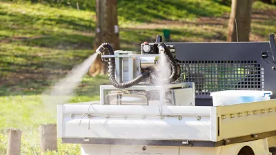 Machine for spraying mosquitoes in outdoor, note shallow depth of fields