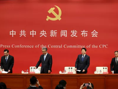 Zhang Fuhai, Deputy Secretary of the Central Commission for Discipline Inspection of the CPC, Huang Jianfa, Executive Vice Minister of the Organization Department of the CPC Central Committee, Hu Heping, Executive Vice Minister of the Publicity Department of the CPC Central Committee, and Tang Fangyu, Director of the Policy Research Office of the CPC Central Committee, take their seats at a press conference following the fifth plenary session of the 20th CPC Central Committee in Beijing, China, October 30, 2026. REUTERS/Maxim Shemetov REFILE - QUALITY REPEAT