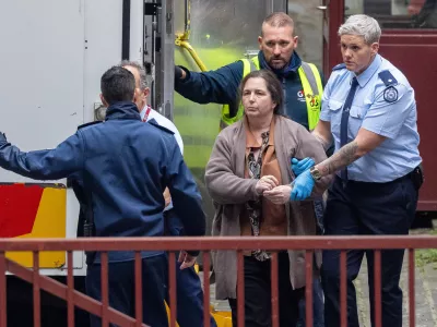 FILE- Erin Patterson arrives at the Supreme Court of Victoria in Melbourne, Australia, Monday, Aug. 25, 2025. (Jason Edwards/AAP Image, POOL via AP, File)