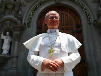 A silicone statue of Pope Leo, created by Peruvian artist Walt Wizard, is displayed outside of a Catholic church ahead of the Pope's November visit to Peru and other countries in South America, in Lima, Peru, October 28, 2026. REUTERS/Stifs Paucca