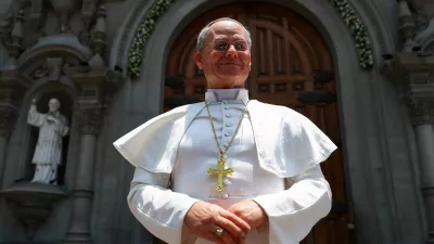 A silicone statue of Pope Leo, created by Peruvian artist Walt Wizard, is displayed outside of a Catholic church ahead of the Pope's November visit to Peru and other countries in South America, in Lima, Peru, October 28, 2026. REUTERS/Stifs Paucca