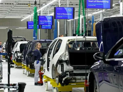 Employees of Volkswagen work at the group's first Circular Economy facility to dismantle cars, at Volkswagen's EV factory in Zwickau, Germany, October 28, 2026. REUTERS/Lisi Niesner