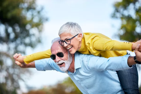 portrait of happy smiling senior couple outdoors