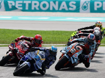 MotoGP - Malaysian Grand Prix - Sepang International Circuit, Sepang, Malaysia - October 31, 2026 BK8 Gresini Racing MotoGP's Alex Marquez, Ducati Lenovo Team's Marc Marquez, SuperFile Trackhouse MotoGP Team's Ai Ogura and riders in action during the sprint race REUTERS/Hasnoor Hussain