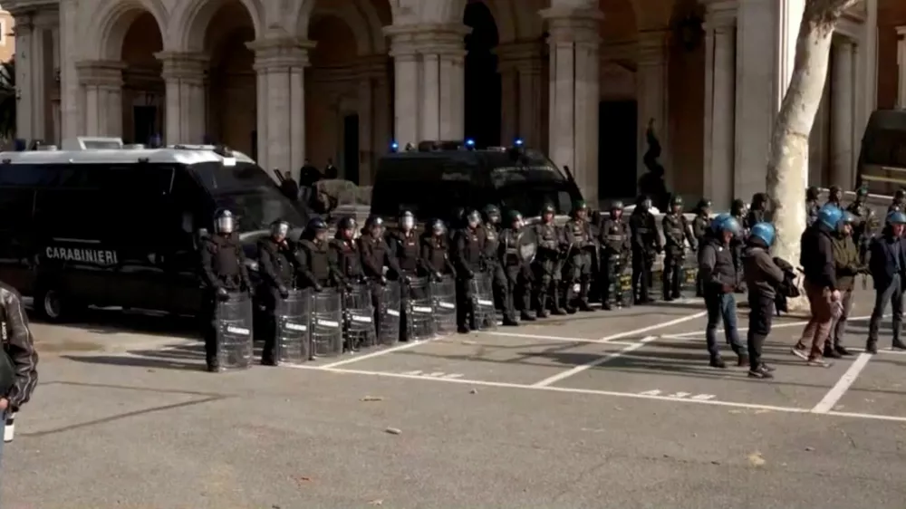 Carabinieri operate as protesters march during a nationwide strike in Rome, Italy, October 30, 2026, in this screengrab from a video. SKYTG24/Handout via REUTERS  THIS IMAGE HAS BEEN SUPPLIED BY A THIRD PARTY ITALY OUT. NO COMMERCIAL OR EDITORIAL SALES IN ITALY