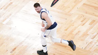 Jun 9, 2024; Boston, Massachusetts, USA; Dallas Mavericks guard Luka Doncic (77) reacts in the first quarter against the Boston Celtics during game two of the 2024 NBA Finals at TD Garden. Mandatory Credit: David Butler II-USA TODAY Sports