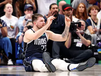 Jun 12, 2024; Dallas, Texas, USA; Dallas Mavericks guard Luka Doncic (77) reacts to receiving his sixth foul during the fourth quarter during game three of the 2024 NBA Finals against the Boston Celtics at American Airlines Center. Mandatory Credit: Kevin Jairaj-USA TODAY Sports