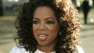 FILE - In this June 25, 2008 file photo, U.S. television presenter Oprah Winfrey arrives for the dinner birthday party of former president of South Africa Nelson Mandela in central London's Hyde Park. Winfrey has settled a defamation lawsuit filed by the ex-headmistress of her girls school in South Africa, lawyers said Tuesday March 23, 2010. The lawsuit by former headmistress Nomvuyo Mzamane claimed Winfrey defamed her in remarks made in the wake of a 2007 sex-abuse scandal at the school. (AP Photo/Lefteris Pitarakis, File)