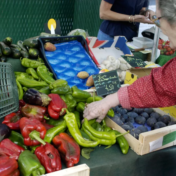 AKTWB8 Perpignan France, Small Local neighborhood grocery store vegetables on Sidewalk in Center of Old City Senior Woman Buying Food, shopper choosing,