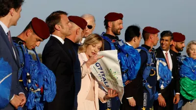 British Prime Minister Rishi Sunak, Canadian Prime Minister Justin Trudeau, French President Emmanuel Macron, U.S. President Joe Biden, Japanese Prime Minister Fumio Kishida and European Commission President Ursula von der Leyen attend a skydiving demonstration, on the first day of the G7 summit, in Savelletri, Italy, June 13, 2024. REUTERS/Louisa Gouliamaki