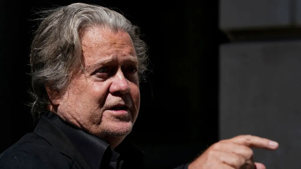 FILE PHOTO: Steve Bannon, talk show host and former White House advisor to former U.S. President Donald Trump, speaks to reporters before entering U.S. District Court in Washington, U.S., June 15, 2022. REUTERS/Elizabeth Frantz/File Photo