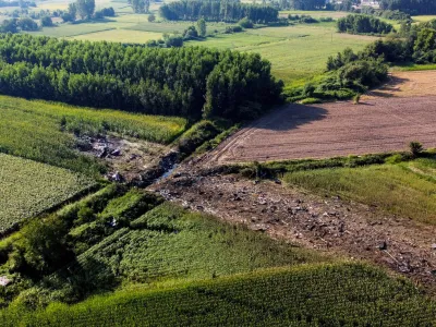 FILE PHOTO: A view of the crash site of an Antonov An-12 cargo plane owned by a Ukrainian company, near Kavala, Greece, July 17, 2022. REUTERS/Alkis Konstantinidis/File Photo