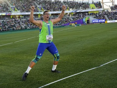 Kristjan Ceh, of Slovenia, celebrates after winning the gold medal in the final of the men's discus throw at the World Athletics Championships on Tuesday, July 19, 2022, in Eugene, Ore. (AP Photo/David J. Phillip)