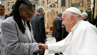 Pope Francis greets Whoopi Goldberg as he meets with comedians during a cultural event at the Vatican, June 14, 2024. Vatican Media/­Handout via REUTERS  ATTENTION EDITORS - THIS IMAGE WAS PROVIDED BY A THIRD PARTY. BEST QUALITY AVAILABLE.