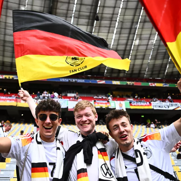 14 June 2024, Bavaria, Munich: Germany fans cheer in the stands ahead of the UEFA Euro 2024 Group A soccer match between Germany and Scotland at Munich Football Arena. Photo: Tom Weller/dpa