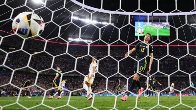 Soccer Football - Euro 2024 - Group A - Germany v Scotland - Munich Football Arena, Munich, Germany - June 14, 2024  Scotland's Jack Hendry reacts after Germany's Emre Can scores their fifth goal REUTERS/Lee Smith