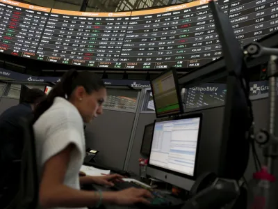 FILE PHOTO: A worker is seen inside the Mexican stock market building in Mexico City, Mexico, February 19, 2016. REUTERS/Carlos Jasso/File Photo