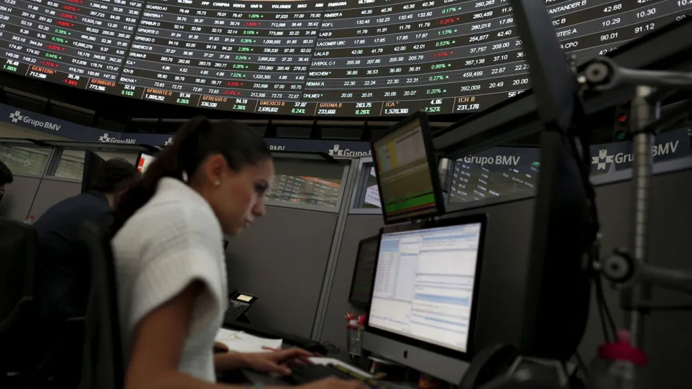 FILE PHOTO: A worker is seen inside the Mexican stock market building in Mexico City, Mexico, February 19, 2016. REUTERS/Carlos Jasso/File Photo