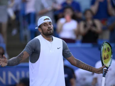 Nick Kyrgios, of Australia, reacts to the crowd after he defeated Yoshihito Nishioka, of Japan, during a final at the Citi Open tennis tournament Sunday, Aug. 7, 2022, in Washington. (AP Photo/Nick Wass)