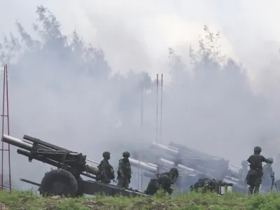 Soldiers fire 155mm howitzers during an annual live fire military exercise in Pingtung county, southern Taiwan August 9, 2022. REUTERS/Ann Wang