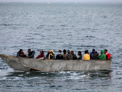 FILED - 23 June 2023, Tunisia, Sfax: A tiny boat carrying migrants is pictured in the Mediterranean Sea, after being intercepted by Tunisian Maritime National Guard and brought back to the shore of the Tunisian southern city of Sfax. Reporting the loss of 47 migrants who set off from the Tunisian coast of Sfax. Photo: Khaled Nasraoui/dpa