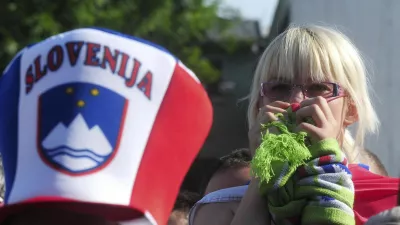 A Slovenian supporter reacts after the 2010 World Cup soccer match between Slovenia and England, at a public viewing arena in Ljubljana June 23, 2010.  REUTERS/Srdjan Zivulovic (SLOVENIA - Tags: SPORT SOCCER WORLD CUP)