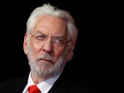 FILE PHOTO: Actor Donald Sutherland arrives for the world premiere of "The Hunger Games: Mockingjay Part 1" at Leicester Square in London November 10, 2014. REUTERS/Luke MacGregor/File Photo