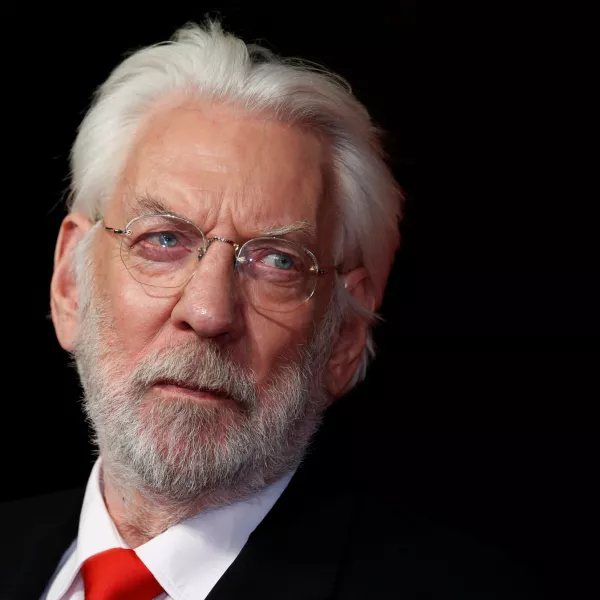 FILE PHOTO: Actor Donald Sutherland arrives for the world premiere of "The Hunger Games: Mockingjay Part 1" at Leicester Square in London November 10, 2014. REUTERS/Luke MacGregor/File Photo