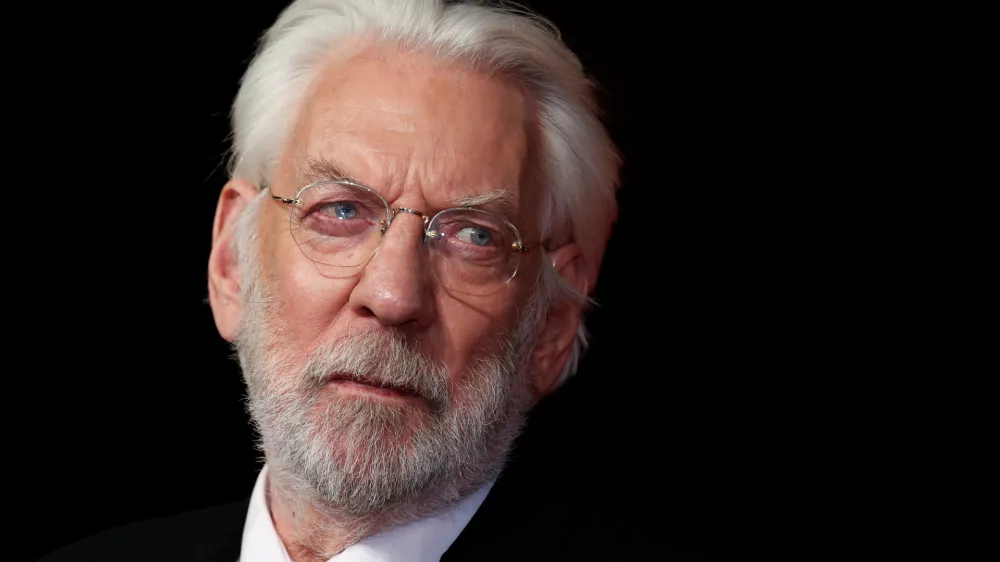 FILE PHOTO: Actor Donald Sutherland arrives for the world premiere of "The Hunger Games: Mockingjay Part 1" at Leicester Square in London November 10, 2014. REUTERS/Luke MacGregor/File Photo