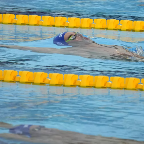 Winner Apostolos Christou of Greece competes during the men's 50m backstroke final at the European Aquatics Championships in Belgrade, Serbia, Friday, June 21, 2024. (AP Photo/Darko Bandic)