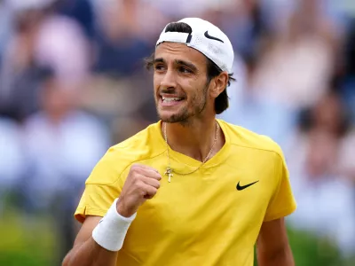 22 June 2024, United Kingdom, London: Italian tennis player Lorenzo Musetti celebrates defeating Australia's Jordan Thompson on day eight of the cinch Championships at The Queen's Club. Photo: Zac Goodwin/PA Wire/dpa