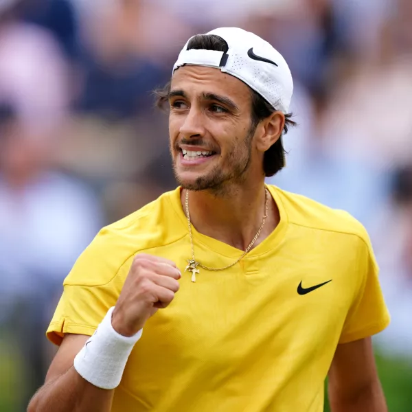 22 June 2024, United Kingdom, London: Italian tennis player Lorenzo Musetti celebrates defeating Australia's Jordan Thompson on day eight of the cinch Championships at The Queen's Club. Photo: Zac Goodwin/PA Wire/dpa