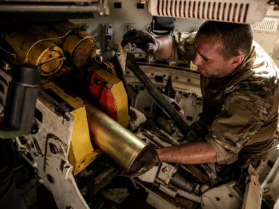 A serviceman of the 24th Mechanized brigade named after King Danylo of the Ukrainian Armed Forces loads a shell inside a 2S1 Gvozdika self-propelled howitzer while firing towards Russian troops in a front line, amid Russia's attack on Ukraine, near the town of Chasiv Yar in Donetsk region, Ukraine June 22, 2024. Oleg Petrasiuk/Press Service of the 24th King Danylo Separate Mechanized Brigade of the Ukrainian Armed Forces/Handout via REUTERS ATTENTION EDITORS - THIS IMAGE HAS BEEN SUPPLIED BY A THIRD PARTY.