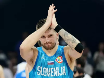 Basketball - FIBA World Cup 2023 - Classification Games 7-8 - Italy v Slovenia - Mall of Asia Arena, Manila, Philippines - September 9, 2023 Slovenia's Luka Doncic applauds fans after the match REUTERS/Eloisa Lopez