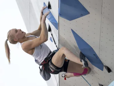 Janja Garnbret from Slovenia competes to win the women's sport climbing lead final at the European Sport Climbing Championships in Munich, Germany, Saturday, Aug. 13, 2022. (Sven Hoppe/dpa via AP)