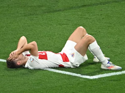 Soccer Football - Euro 2024 - Group B - Croatia v Italy - Leipzig Stadium, Leipzig, Germany - June 24, 2024 Croatia's Josip Stanisic looks dejected after the match REUTERS/Annegret Hilse