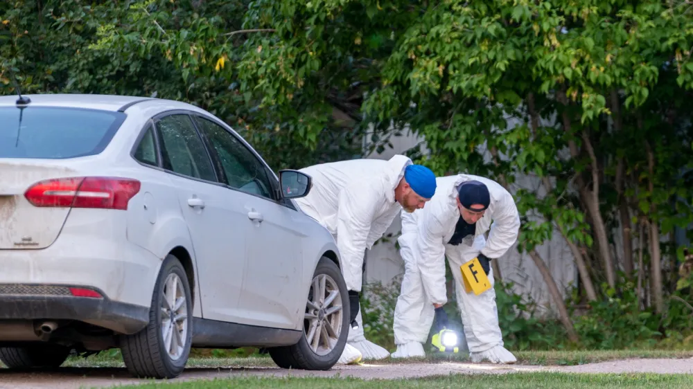 04 September 2022, Canada, Weldon: Investigators work at a crime scene in Weldon after 10 people died and 15 are injured following stabbings that occurred at James Smith Cree Nation and Weldon in Saskatchewan. Photo: Heywood Yu/Canadian Press via ZUMA Press/dpa