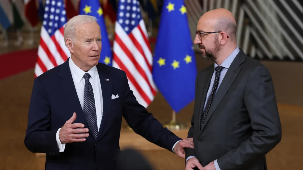 U.S. President Joe Biden speaks to the media next to European Council President Charles Michel, during a European Union leaders summit, amid Russia's invasion of Ukraine, in Brussels, Belgium, March 24, 2022. REUTERS/Evelyn Hockstein