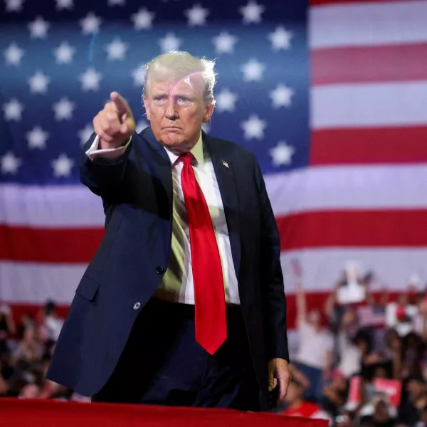 FILE PHOTO: Former U.S. President and Republican presidential candidate Donald Trump gestures during a campaign event in Philadelphia, Pennsylvania, U.S., June 22, 2024. REUTERS/Tom Brenner/File Photo