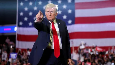 FILE PHOTO: Former U.S. President and Republican presidential candidate Donald Trump gestures during a campaign event in Philadelphia, Pennsylvania, U.S., June 22, 2024. REUTERS/Tom Brenner/File Photo