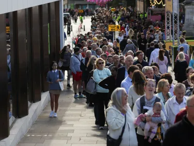 People queue at Bristo Square, following the death of Britain's Queen Elizabeth, in Edinburgh, Scotland, Britain, September 13, 2022. REUTERS/Russell Cheyne