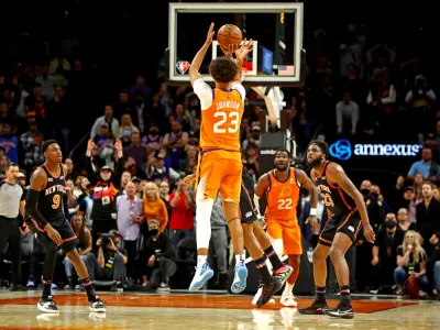 Mar 4, 2022; Phoenix, Arizona, USA; Phoenix Suns forward Cameron Johnson (23) shoots the game winning shot in the closing seconds of the game against the New York Knicks at Footprint Center. Mandatory Credit: Mark J. Rebilas-USA TODAY Sports