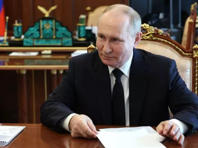 Russian President Vladimir Putin speaks to Vladimir Saldo, the Moscow-appointed head of the Russian-controlled Kherson region of Ukraine, during their meeting at the Kremlin in Moscow, Russia, Tuesday, June 25, 2024. (Vyacheslav Prokofyev, Sputnik, Kremlin Pool Photo via AP)