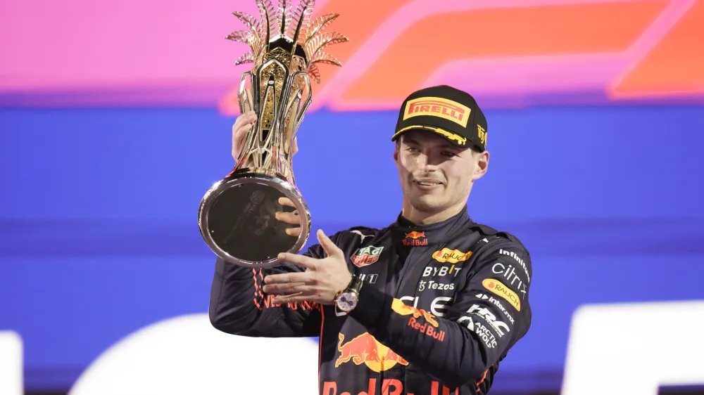 Red Bull driver Max Verstappen of the Netherlands celebrates after he won the Formula One Grand Prix it in Jiddah, Saudi Arabia, Sunday, March 27, 2022. (AP Photo/Hassan Ammar)